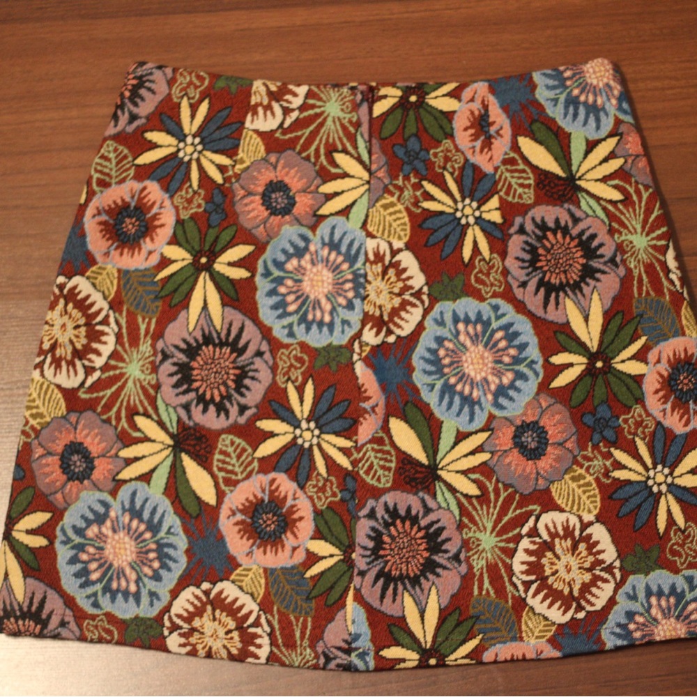 Beautiful floral mini skirt. Never worn.